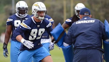 May 14, 2016; San Diego, CA, USA; San Diego Chargers defensive end Joey Bosa (L) participates in a dril during rookie minicamp at Charger Park. Mandatory Credit: Jake Roth-USA TODAY Sports