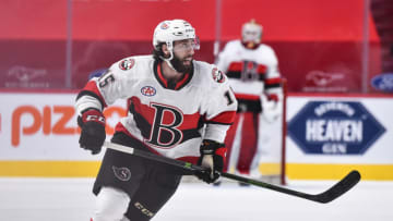 MONTREAL, QC - FEBRUARY 19: Clark Bishop #15 of the Belleville Senators skates against the Laval Rocket during the first period at the Bell Centre on February 19, 2021 in Montreal, Canada. The Laval Rocket defeated the Belleville Senators 5-2. (Photo by Minas Panagiotakis/Getty Images)