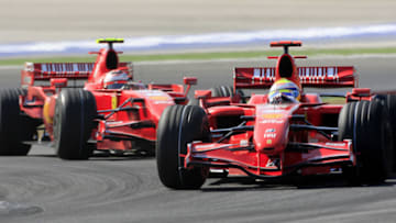 Felipe Massa and Kimi Raikkonen, Ferrari, Formula 1 (Photo credit: BERTRAND GUAY/AFP via Getty Images)