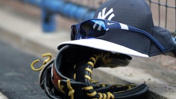 Mar 25, 2015; Tampa, FL, USA; A general view of New York Yankees hat, sunglasses and glove in the dugout against the New York Mets at George M. Steinbrenner Field. Mandatory Credit: Kim Klement-USA TODAY Sports