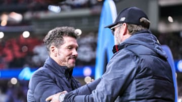 MADRID, SPAIN - FEBRUARY 18: Diego Pablo Simeone, manager of Atletico de Madrid greets Jurgen Klopp, manager of Liverpool FC during the UEFA Champions League round of 16 first leg match between Atletico Madrid and Liverpool FC at Wanda Metropolitano on February 18, 2020 in Madrid, Spain. (Photo by Sonia Canada/Getty Images)