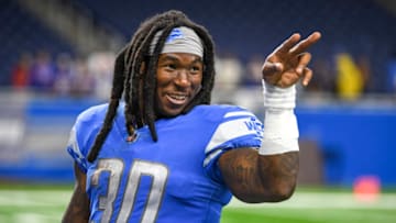 DETROIT, MICHIGAN - AUGUST 13: Jamaal Williams #30 of the Detroit Lions points after the preseason game against the Buffalo Bills at Ford Field on August 13, 2021 in Detroit, Michigan. (Photo by Nic Antaya/Getty Images)