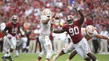 Oct 24, 2015; Tuscaloosa, AL, USA; Alabama Crimson Tide defensive lineman Jarran Reed (90) pressures Tennessee Volunteers quarterback Joshua Dobbs (11) during the second quarter at Bryant-Denny Stadium. Mandatory Credit: John David Mercer-USA TODAY Sports