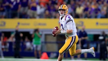 ARLINGTON, TX - SEPTEMBER 02: Joe Burrow #9 of the LSU Tigers looks for an open receiver against the Miami Hurricanes in the first quarter of The AdvoCare Classic at AT&T Stadium on September 2, 2018 in Arlington, Texas. (Photo by Tom Pennington/Getty Images)