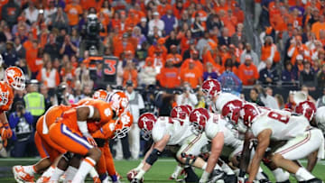Jan 11, 2016; Glendale, AZ, USA; Alabama Crimson Tide center Ryan Kelly (70) prepares to snap the ball against the Clemson Tigers in the 2016 CFP National Championship at University of Phoenix Stadium. Mandatory Credit: Mark J. Rebilas-USA TODAY Sports