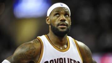 Dec 9, 2014; Cleveland, OH, USA; Cleveland Cavaliers forward LeBron James (23) reacts in the third quarter against the Toronto Raptors at Quicken Loans Arena. Mandatory Credit: David Richard-USA TODAY Sports