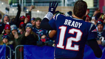 FOXBOROUGH, MASSACHUSETTS - DECEMBER 30: Tom Brady #12 of the New England Patriots runs off the field after a game against the New York Jets at Gillette Stadium on December 30, 2018 in Foxborough, Massachusetts. (Photo by Billie Weiss/Getty Images)