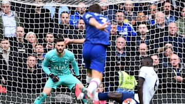Chelsea's Spanish defender Marcos Alonso (C) scores his team's second goal during the English Premier League football match between Chelsea and Tottenham Hotspur at Stamford Bridge in London on February 22 2020. (Photo by Glyn KIRK / AFP) / RESTRICTED TO EDITORIAL USE. No use with unauthorized audio, video, data, fixture lists, club/league logos or 'live' services. Online in-match use limited to 120 images. An additional 40 images may be used in extra time. No video emulation. Social media in-match use limited to 120 images. An additional 40 images may be used in extra time. No use in betting publications, games or single club/league/player publications. / (Photo by GLYN KIRK/AFP via Getty Images)