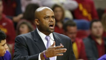 AMES, IA - NOVEMBER 25: Head coach Billy Wright of the Western Illinois Leathernecks coach from the bench in the first half of play against the Iowa State Cyclones at Hilton Coliseum on November 25, 2017 in Ames, Iowa. (Photo by David Purdy/Getty Images)