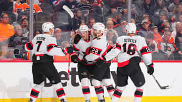 PHILADELPHIA, PA - NOVEMBER 12: Thomas Chabot #72 of the Ottawa Senators celebrates with Claude Giroux #28, Brady Tkachuk #7, and Tim Stutzle #18 after scoring a goal against the Philadelphia Flyers in the first period at the Wells Fargo Center on November 12, 2022 in Philadelphia, Pennsylvania. (Photo by Mitchell Leff/Getty Images)