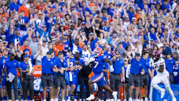 GAINESVILLE, FLORIDA - NOVEMBER 12: Trevor Etienne #7 of the Florida Gators scores a touchdown during the 1st quarter of a game against the South Carolina Gamecocks at Ben Hill Griffin Stadium on November 12, 2022 in Gainesville, Florida. (Photo by James Gilbert/Getty Images)