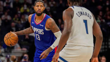 Los Angeles Clippers forward Paul George brings the ball up the court against the Minnesota Timberwolves. Mandatory Credit: Nick Wosika-USA TODAY Sports