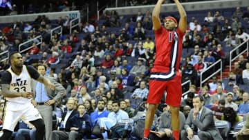 Feb 18, 2016; Washington, DC, USA; Washington Wizards forward Jared Dudley (1) shoots as Utah Jazz forward Trevor Booker (33) looks on during the first half at Verizon Center. Mandatory Credit: Brad Mills-USA TODAY Sports
