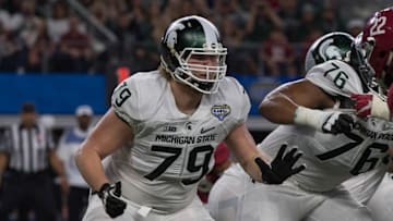 Dec 31, 2015; Arlington, TX, USA; Michigan State Spartans offensive lineman Kodi Kieler (79) during the game against the Alabama Crimson Tide in the 2015 Cotton Bowl at AT&T Stadium. Mandatory Credit: Jerome Miron-USA TODAY Sports