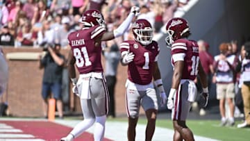 Oct 7, 2023; Starkville, Mississippi, USA; Mississippi State Bulldogs wide receiver Zavion Thomas (1) celebrates with tight end Antonio Harmon (81) and wide receiver Jordan Mosley (18) after a touchdown against the Western Michigan Broncos during the first quarter at Davis Wade Stadium at Scott Field. Mandatory Credit: Matt Bush-USA TODAY Sports