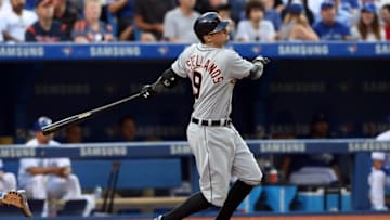 Jul 7, 2016; Toronto, Ontario, CAN; Detroit Tigers third baseman Nick Castellanos (9) hits a solo home run against the Toronto Blue Jays in the fourth inning at Rogers Centre. Mandatory Credit: Kevin Sousa-USA TODAY Sports