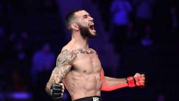 NEW YORK, NY - NOVEMBER 03: Shane Burgos celebrates his submission victory over Kurt Holobaugh in their featherweight bout during the UFC 230 event inside Madison Square Garden on November 3, 2018 in New York, New York. (Photo by Jeff Bottari/Zuffa LLC/Zuffa LLC via Getty Images)