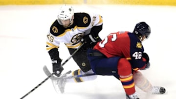 Mar 7, 2016; Sunrise, FL, USA; Boston Bruins center Landon Ferraro (29) skates with the puck as Florida Panthers defenseman Jakub Kindl (46) defends in the first period at BB&T Center. Mandatory Credit: Robert Mayer-USA TODAY Sports