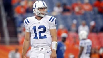 Sep 7, 2014; Denver, CO, USA; Indianapolis Colts quarterback Andrew Luck (12) warms up before the game against the Denver Broncos at Sports Authority Field at Mile High. Mandatory Credit: Chris Humphreys-USA TODAY Sports