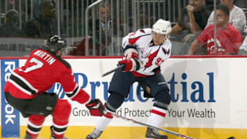 NEWARK, NJ - SEPTEMBER 29: Michael Nylander of the Washington Capitals passes the puck during the game against the New Jersey Devils on September 29, 2008 at the Prudential Center in Newark, New Jersey. (Photo by Bruce Bennett/Getty Images)