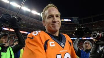 Jan 3, 2016; Denver, CO, USA; Denver Broncos quarterback Peyton Manning (18) celebrates winning following the game against the San Diego Chargers at Sports Authority Field at Mile High. The Broncos defeated the Chargers 27-20. Mandatory Credit: Ron Chenoy-USA TODAY Sports