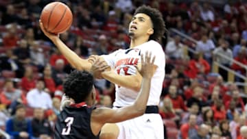 LOUISVILLE, KY - NOVEMBER 08: Jordan Nwora #33 of the Louisville Cardinals shoots the ball against the Nicholls State Colonels at KFC YUM! Center on November 8, 2018 in Louisville, Kentucky. (Photo by Andy Lyons/Getty Images)