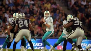 Sep 28, 2014; London, UNITED KINGDOM; Miami Dolphins quarterback Ryan Tannehill (17) throws a pass against the Oakland Raiders in the NFL International Series game at Wembley Stadium. Mandatory Credit: Kirby Lee-USA TODAY Sports