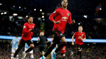 Manchester United's Marcus Rashford celebrates scoring his side's first goal of the game during the Premier League match at the Etihad Stadium, Manchester. (Photo by Martin Rickett/PA Images via Getty Images)