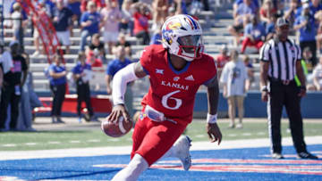 Sep 24, 2022; Lawrence, Kansas, USA; Kansas Jayhawks quarterback Jalon Daniels (6) drops back to pass against the Duke Blue Devils during the second half of the game at David Booth Kansas Memorial Stadium. Mandatory Credit: Denny Medley-USA TODAY Sports