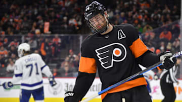 Dec 5, 2021; Philadelphia, Pennsylvania, USA; Philadelphia Flyers center Sean Couturier (14) against the Tampa Bay Lightning during the third period at Wells Fargo Center. Mandatory Credit: Eric Hartline-USA TODAY Sports