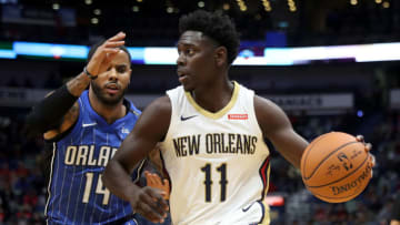 NEW ORLEANS, LA - OCTOBER 30: Jrue Holiday #11 of the New Orleans Pelicans and D.J. Augustin #14 of the Orlando Magic (Photo by Chris Graythen/Getty Images)