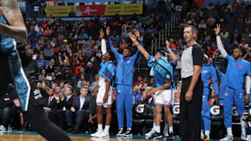 OKC Thunder bench reacts to three point basket against the New Zealand Breakers during the preseason (Photo by Zach Beeker/NBAE via Getty Images)