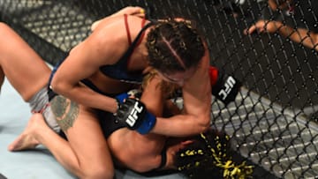 DALLAS, TX - SEPTEMBER 08: (L-R) Tatiana Suarez elbows Carla Esparza in their women's strawweight fight during the UFC 228 event at American Airlines Center on September 8, 2018 in Dallas, Texas. (Photo by Josh Hedges/Zuffa LLC/Zuffa LLC via Getty Images)