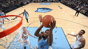 MEMPHIS, TN - NOVEMBER 7: Jaren Jackson Jr. #13 of the Memphis Grizzlies goes to the basket against the Denver Nuggets on November 7, 2018 at FedExForum in Memphis, Tennessee. NOTE TO USER: User expressly acknowledges and agrees that, by downloading and or using this photograph, User is consenting to the terms and conditions of the Getty Images License Agreement. Mandatory Copyright Notice: Copyright 2018 NBAE (Photo by Joe Murphy/NBAE via Getty Images)