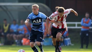 SUNDERLAND, ENGLAND - AUGUST 23: Alex Pritchard of Spurs holds off Joshua Robson of Sunderland during the Barclays U21 Premier League match between Sunderland U21 and Tottenham Hotspur U21 at Eppleton Colliery Welfare ground on August 23, 2015 in Sunderland, England. (Photo by Jan Kruger/Getty Images)