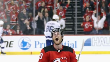 NEWARK, NJ - APRIL 16: Blake Coleman #20 of the New Jersey Devils celebrates his empty net goal at 19:02 of the third period against the Tampa Bay Lightning in Game Three of the Eastern Conference First Round during the 2018 NHL Stanley Cup Playoffs at the Prudential Center on April 16, 2018 in Newark, New Jersey. The Devils defeated the Lightning 5-2. (Photo by Bruce Bennett/Getty Images)