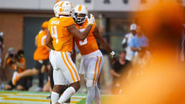 Tennessee quarterback Hendon Hooker (5) and Tennessee wide receiver Cedric Tillman (4) celebrate a play during football game between Tennessee and Ball State at Neyland Stadium in Knoxville, Tenn. on Thursday, Sept. 1, 2022.Kns Utvbs0901