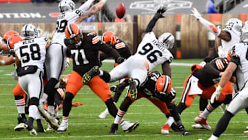 Nov 1, 2020; Cleveland, Ohio, USA; Las Vegas Raiders defensive end Maxx Crosby (98) and defensive end Clelin Ferrell (96) try to block a field goal attempt by Cleveland Browns kicker Cody Parkey (2) during the second half at FirstEnergy Stadium. Mandatory Credit: Ken Blaze-USA TODAY Sports