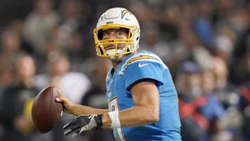 OAKLAND, CALIFORNIA - NOVEMBER 07: Philip Rivers #17 of the Los Angeles Chargers drops back to pass against the Oakland Raiders during the second quarter of an NFL football game at RingCentral Coliseum on November 07, 2019 in Oakland, California. (Photo by Thearon W. Henderson/Getty Images)