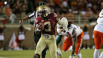 TALLAHASSEE, FL - OCTOBER 10: Jesus Wilson #3 of the Florida State Seminoles is forced out of bounds during a game against the Miami Hurricanes at Doak Campbell Stadium on October 10, 2015 in Tallahassee, Florida. (Photo by Mike Ehrmann/Getty Images)