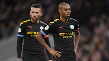 LONDON, ENGLAND - FEBRUARY 02: Fernandinho and Nicolas Otamendi of Manchester City react during the Premier League match between Tottenham Hotspur and Manchester City at Tottenham Hotspur Stadium on February 02, 2020 in London, United Kingdom. (Photo by Laurence Griffiths/Getty Images)