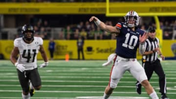 Auburn quarterback Bo Nix (10) throws the ball at AT&T Stadium in Arlington, Texas, on Saturday, Aug. 31, 2019. Auburn football defeated Oregon 27-21.