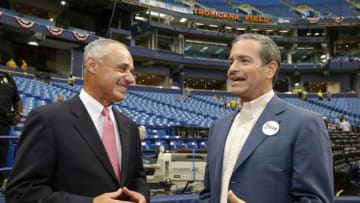 ST. PETERSBURG, FL - APRIL 3: Tampa Bay Rays principal owner Stuart Sternberg greets Commissioner of Baseball Robert D. Manfred Jr. before the Opening Day game against the Toronto Blue Jays at Tropicana Field on Sunday, April 3, 2016 in St. Petersburg, Florida. (Photo by Mike Carlson/MLB Photos via Getty Images)