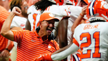 Sep 5, 2022; Atlanta, Georgia, USA; Clemson Tigers head coach Dabo Swinney reacts to a blocked punt by Clemson Tigers linebacker Wade Woodaz (17) against the Georgia Tech Yellow Jackets during the second half of the Chick-fil-A kickoff game at Mercedes-Benz Stadium. Mandatory Credit: John David Mercer-USA TODAY Sports
