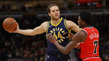 CHICAGO, IL - NOVEMBER 10: Bojan Bogdanovic #44 of the Indiana Pacers looks to pass against Justin Holiday #7 of the Chicago Bulls at the United Center on November 10, 2017 in Chicago, Illinois. The Pacers defeated the Bulls 105-87. NOTE TO USER: User expressly acknowledges and agrees that, by downloading and or using this photograph, User is consenting to the terms and conditions of the Getty Images License Agreement. (Photo by Jonathan Daniel/Getty Images)