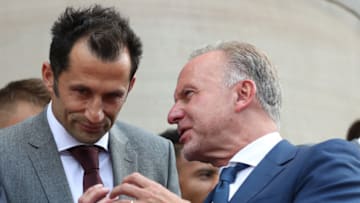 MUNICH, GERMANY - AUGUST 28: Hasan Salihamidzic, sporting director of FC Bayern Muenchen talks with Karl-Heinz Rummenigge, CEO of FC Bayern Muenchen during a reception of the Bundesliga champion and DFB Cup winner FC Bayern Muenchen at Staatskanzlei on August 28, 2019 in Munich, Germany. (Photo by A. Hassenstein/Getty Images for FC Bayern)