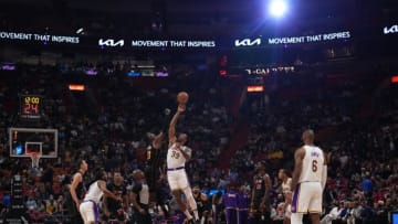 Los Angeles Lakers center Dwight Howard (39) and Miami Heat center Bam Adebayo (13) take the opening tip off(Jasen Vinlove-USA TODAY Sports)
