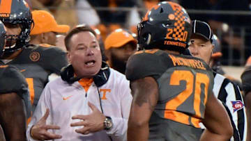 NASHVILLE, TN - DECEMBER 30: Head coach Butch Jones coaches Cortez McDowell