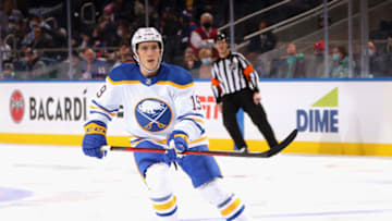 ELMONT, NEW YORK - DECEMBER 30: Peyton Krebs #19 of the Buffalo Sabres skates against the New York Islanders at the UBS Arena on December 30, 2021 in Elmont, New York. (Photo by Bruce Bennett/Getty Images)
