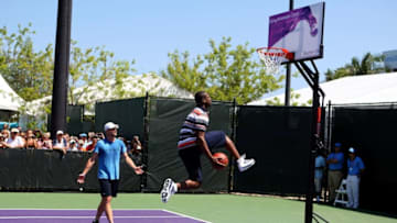 KEY BISCAYNE, FL - MARCH 27: Andy Roddick and Dwyane Wade of the Miami Heat play a game of H.O.R.S.E during day five of the 2010 Sony Ericsson Open at Crandon Park Tennis Center on March 27, 2010 in Key Biscayne, Florida. (Photo by Al Bello/Getty Images)